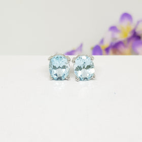 CM51 : ต่างหูเงินแท้ 925 ฝัง Blue Topaz