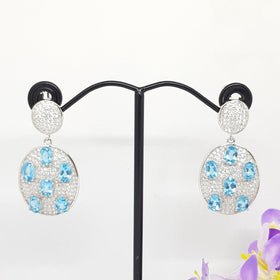 CM44 : ต่างหูเงินแท้ 925 ฝัง Blue Topaz